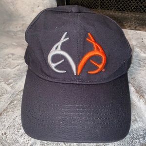 RealTree Outfitters Hat - Black, with orange and silver emblem